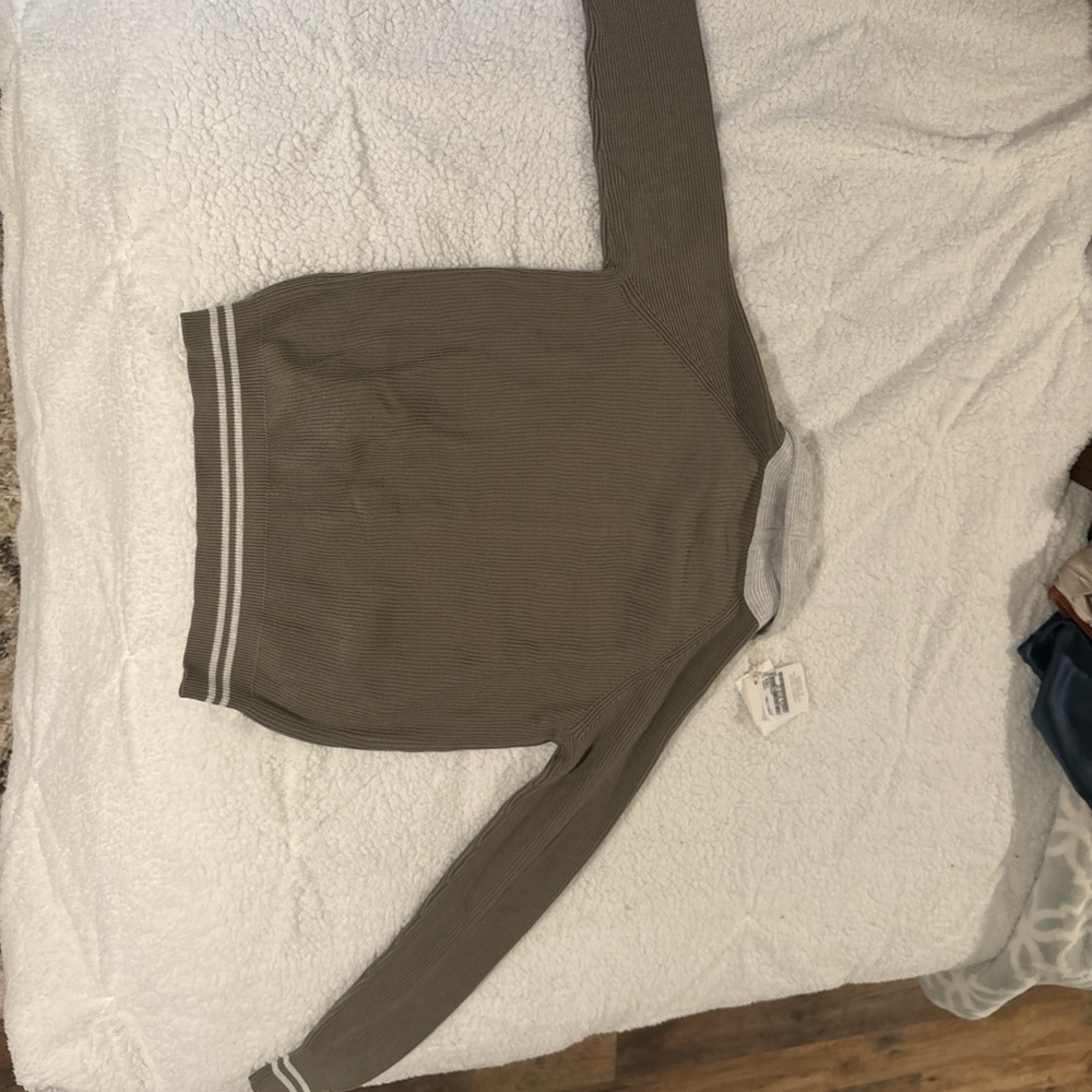 Brand new, never worn, with tags